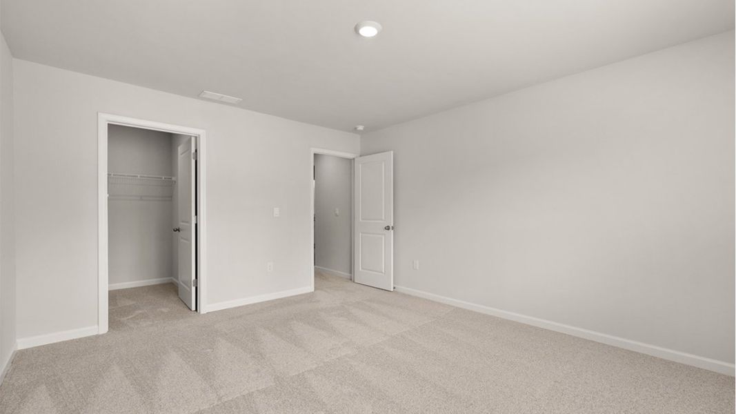 Representative unfurnished interior of a home built from the Mansfield by D.R. Horton in Highland Hills, Graniteville (Image 25).