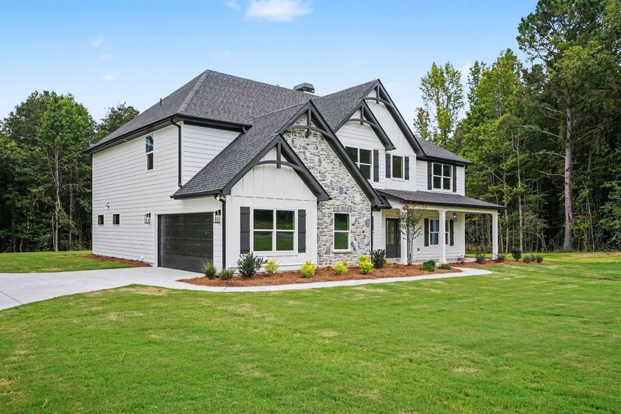 Front exterior of a new home in Flint Farms, Concord, GA, highlighting curb appeal (Image 25).