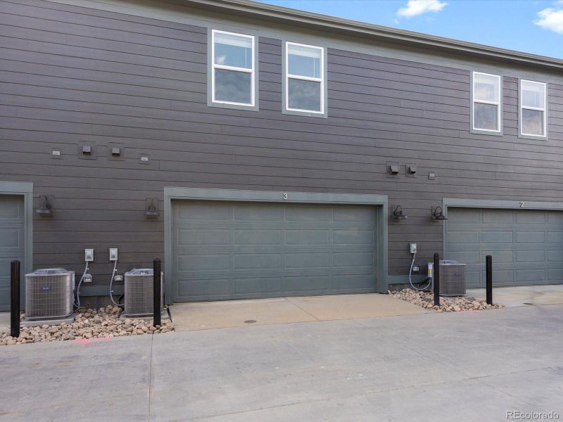 Front exterior of a new home in Poudre Heights: The Meadow Collection, Windsor, CO, highlighting curb appeal (Image 1).
