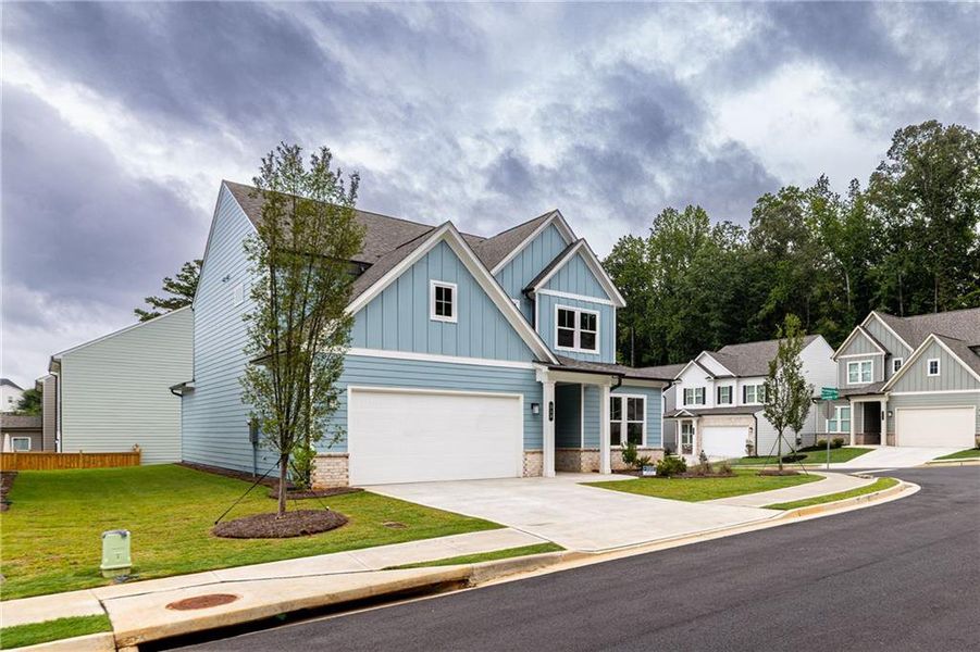 Front exterior of a new home in Enclave at Edgewater, Canton, GA, highlighting curb appeal (Image 34).