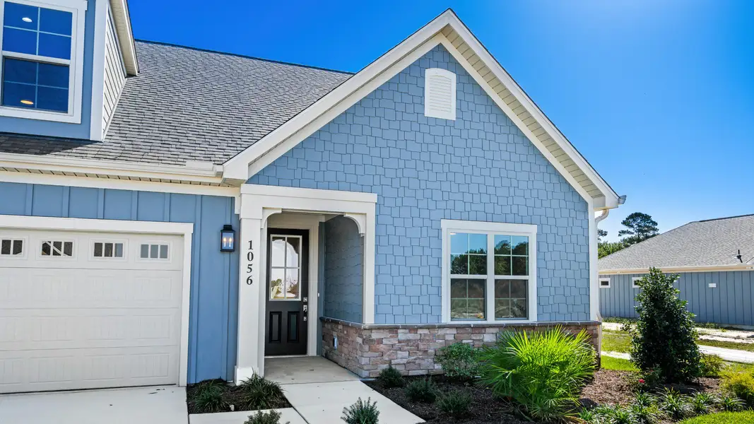Representative exterior details of a home built from the Capri IV by Epcon Communities in Courtyards by Carrell, Ocean Isle Beach (Image 3). Representative exterior details of a home built from the Capri IV by Epcon Communities in Courtyards by Carrell, Ocean Isle Beach (Image 3).