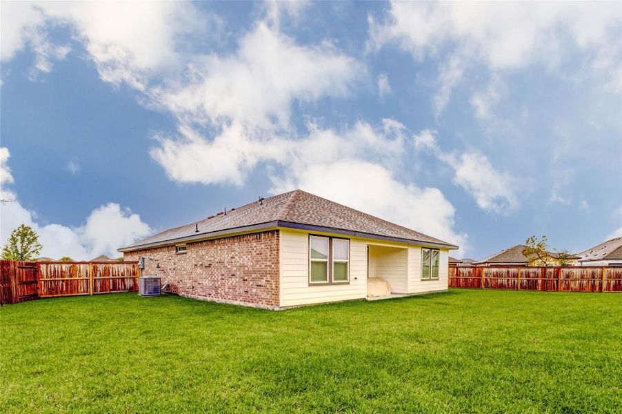 Exterior details and patio area of a home in Canterra Creek 45' and 50' Homesites, Iowa Colony (Image 21).