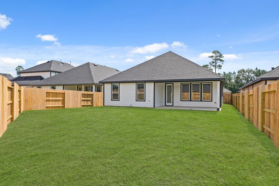 Exterior details and patio area of a home in Hills of Westlake, Conroe (Image 3). Exterior details and patio area of a home in Hills of Westlake, Conroe (Image 3).