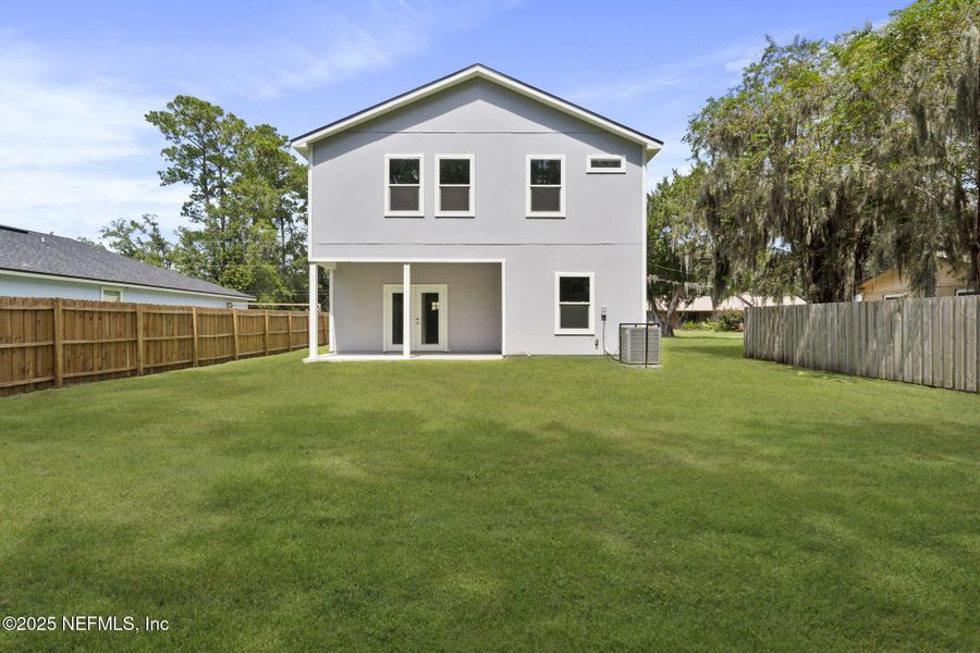 Front exterior of a new home in , Fleming Island, FL, highlighting curb appeal (Image 19).