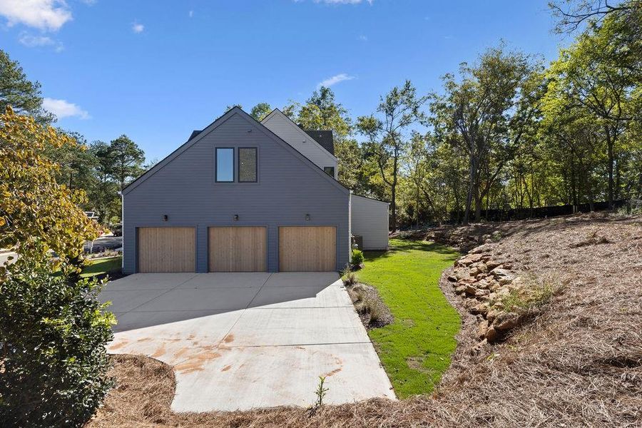 Front exterior of a new home in Aster, Roswell, GA, highlighting curb appeal (Image 32).