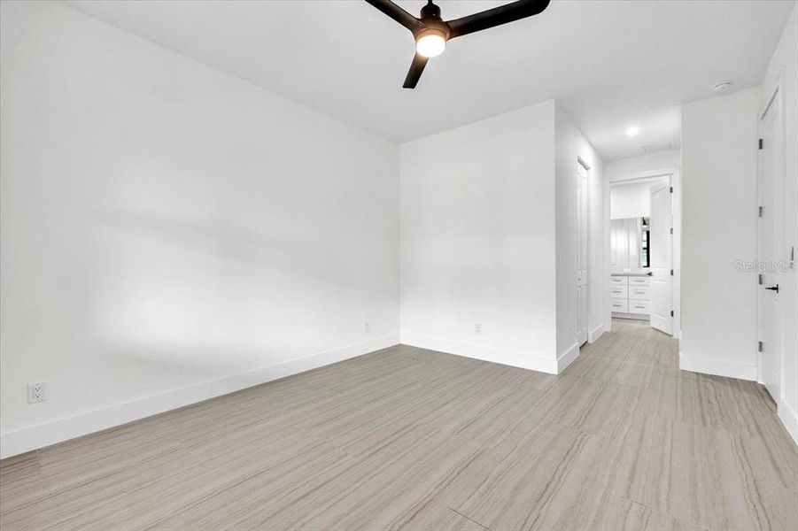 Spacious, unfurnished interior of a new home in , Port Charlotte (Image 32).