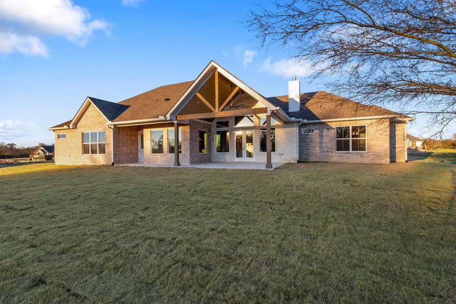 Exterior details and patio area of a home in , Bryan (Image 3).