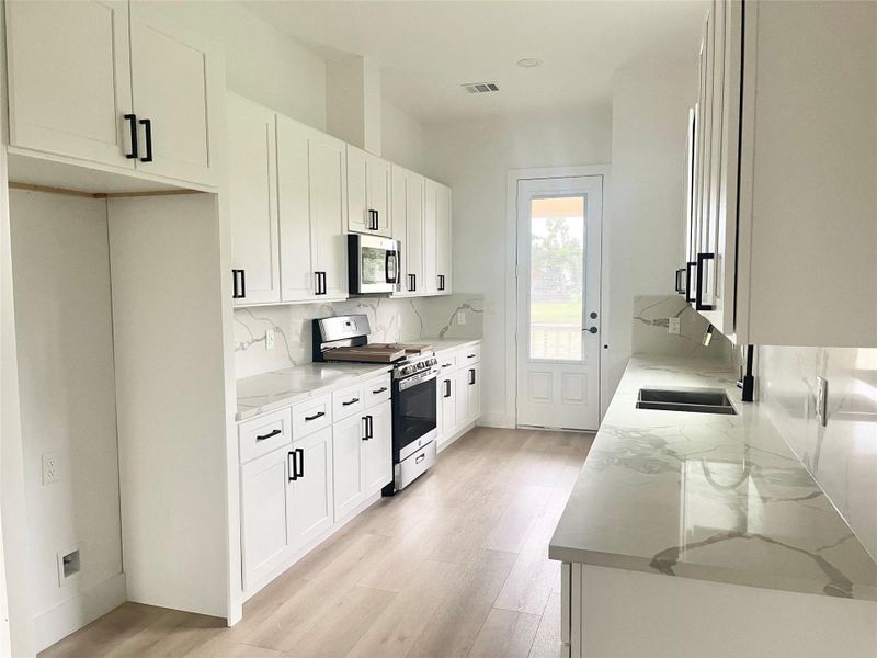 Furnished interior view inside a new home in , Houston (Image 3).