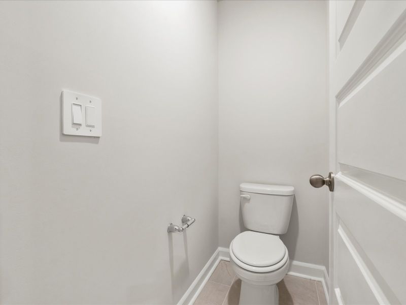 Furnished interior view inside a new home in Waterside - Boardwalk Series, Longs (Image 10).