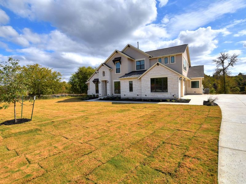 Representative exterior photo of a completed home built from the Madera II by Giddens Homes in Scofield Farms Estates, Georgetown, TX (Image 39).