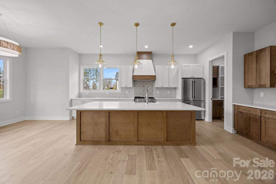 Furnished interior view inside a new home in , Statesville (Image 9).