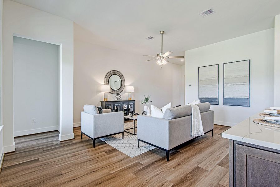 A second look at the living area reveals the seamless connection between form and function—comfortable, welcoming, and just waiting for your personal touch. A second look at the living area reveals the seamless connection between form and function—comfortable, welcoming, and just waiting for your personal touch.