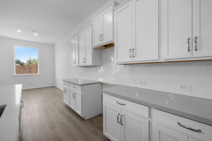 This kitchen is not only a functional space but also has ample storage. Whether you're a seasoned chef or just love to gather and enjoy good food, this kitchen is a dream come true. This kitchen is not only a functional space but also has ample storage. Whether you're a seasoned chef or just love to gather and enjoy good food, this kitchen is a dream come true.