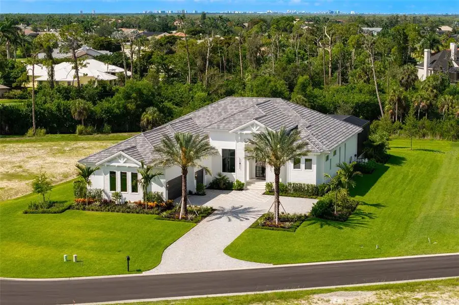 Front exterior of a new home in , Fort Myers, FL, highlighting curb appeal (Image 2). Front exterior of a new home in , Fort Myers, FL, highlighting curb appeal (Image 2).
