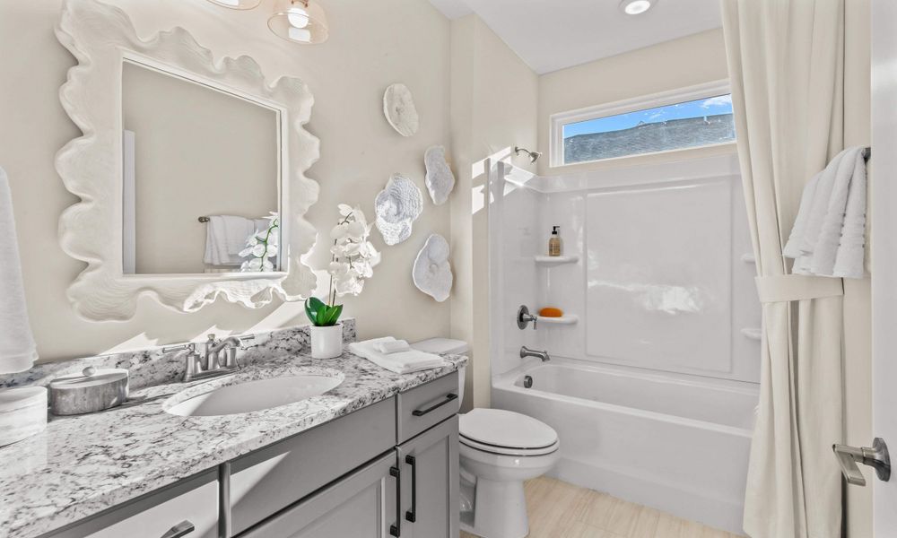 Representative furnished interior of a home built from the The Longboard by Chesapeake Homes in Bridgewater - Shorehaven Village, Little River (Image 52).