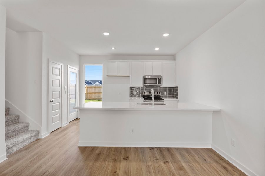 Representative furnished interior of a home built from the The 1340 by Stylecraft Builders in Townhomes at Yaupon Trails, Bryan (Image 3).