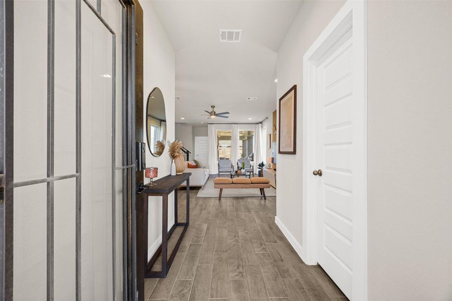 Furnished interior view inside a new home in Sunterra, Katy (Image 14).