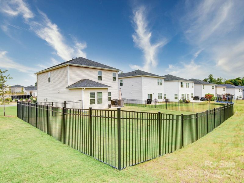 BACK VIEW of 102 Guardian Gate Dr. and FENCE.