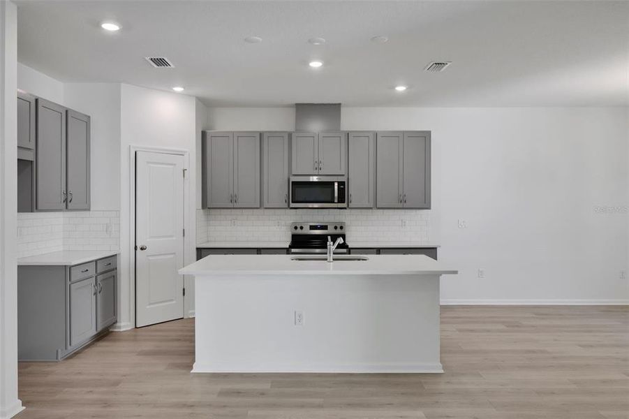 Furnished interior view inside a new home in Seaport Village, Tavares (Image 6).