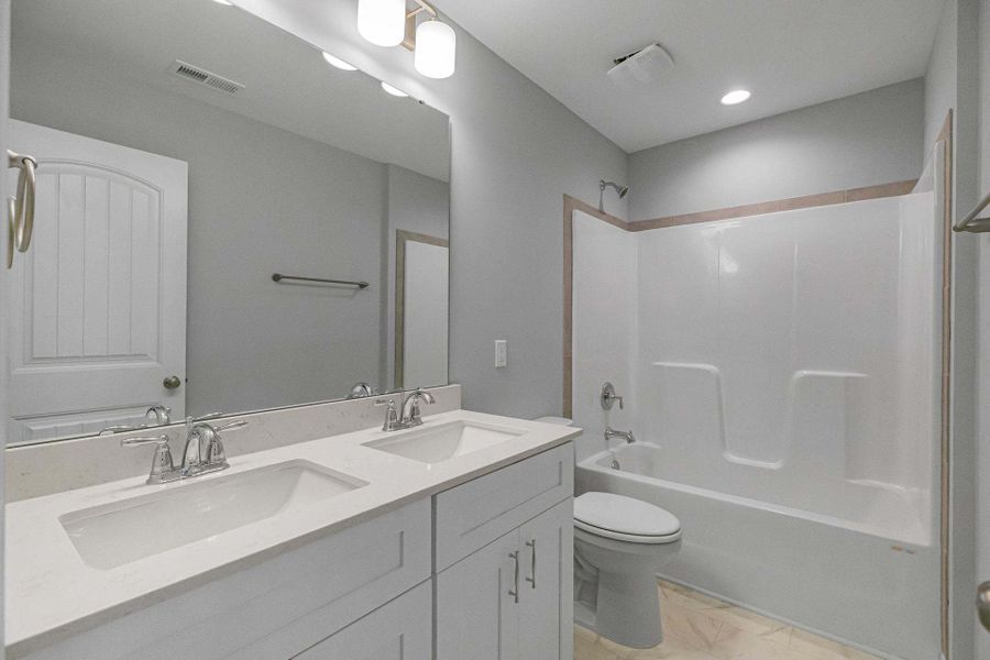 Representative furnished interior of a home built from the Drayton by Caviness & Cates Communities in Bartlett Manor, Youngsville (Image 243).