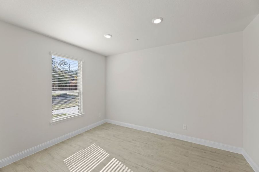 Representative exterior photo of a completed home built from the Whitney by Impression Homes in Timber Ridge, Corinth, TX (Image 22).