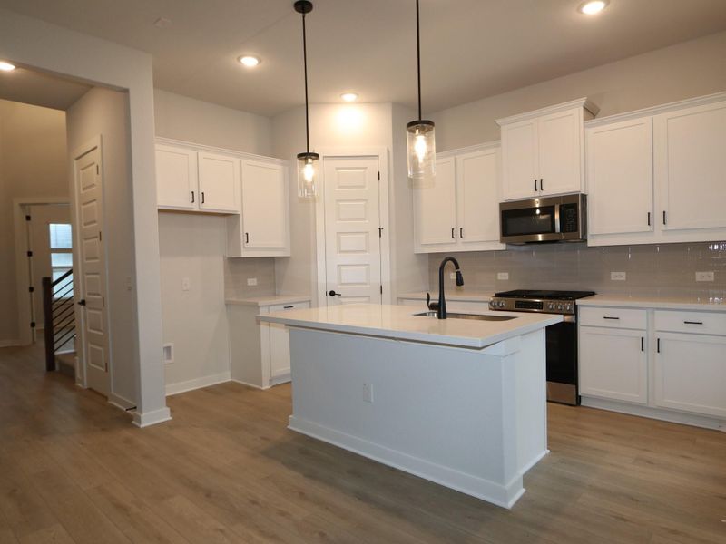 Furnished interior view inside a new home in Cascades at Onion Creek, Austin (Image 7). Furnished interior view inside a new home in Cascades at Onion Creek, Austin (Image 7).