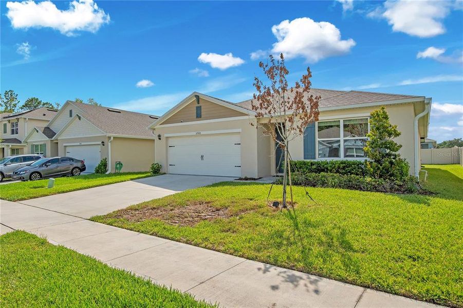 Front exterior of a new home in , Sanford, FL, highlighting curb appeal (Image 23).