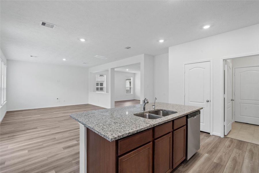 Additional view of the kitchen island looking out to the Great Room