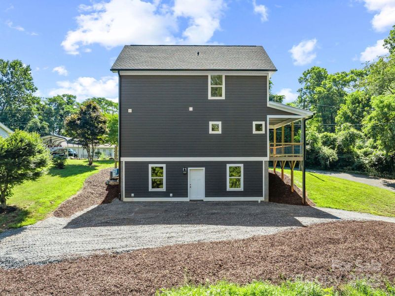 Exterior details and patio area of a home in , Asheville (Image 26).