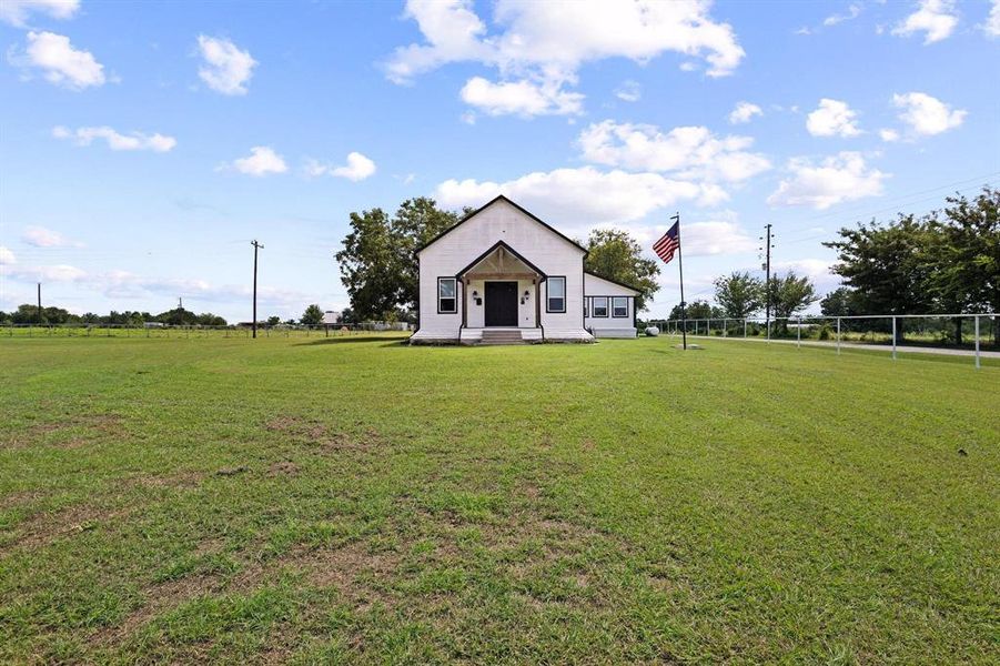 Front exterior of a new home in , Collinsville, TX, highlighting curb appeal (Image 21). Front exterior of a new home in , Collinsville, TX, highlighting curb appeal (Image 21).