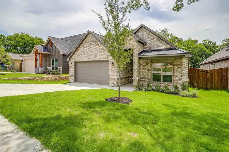 Front exterior of a new home in , Fort Worth, TX, highlighting curb appeal (Image 1). Front exterior of a new home in , Fort Worth, TX, highlighting curb appeal (Image 1).
