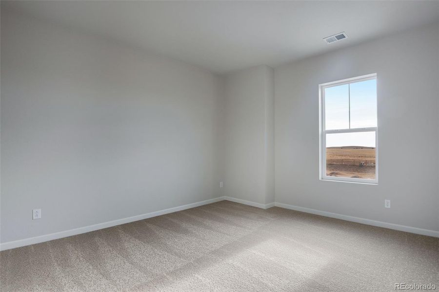 Spacious, unfurnished interior of a new home in Medley at Reunion Ridge, Commerce City (Image 23).