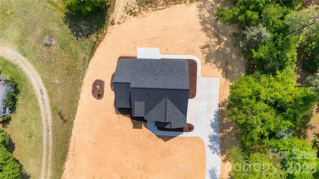 Front exterior of a new home in , Clover, SC, highlighting curb appeal (Image 19).