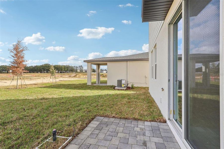 Exterior details and patio area of a home in , Davenport (Image 20).