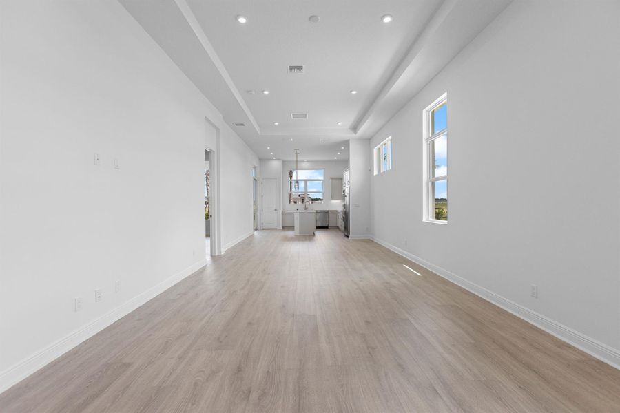 Furnished interior view inside a new home in PGA Village Verano, Port St. Lucie (Image 11).