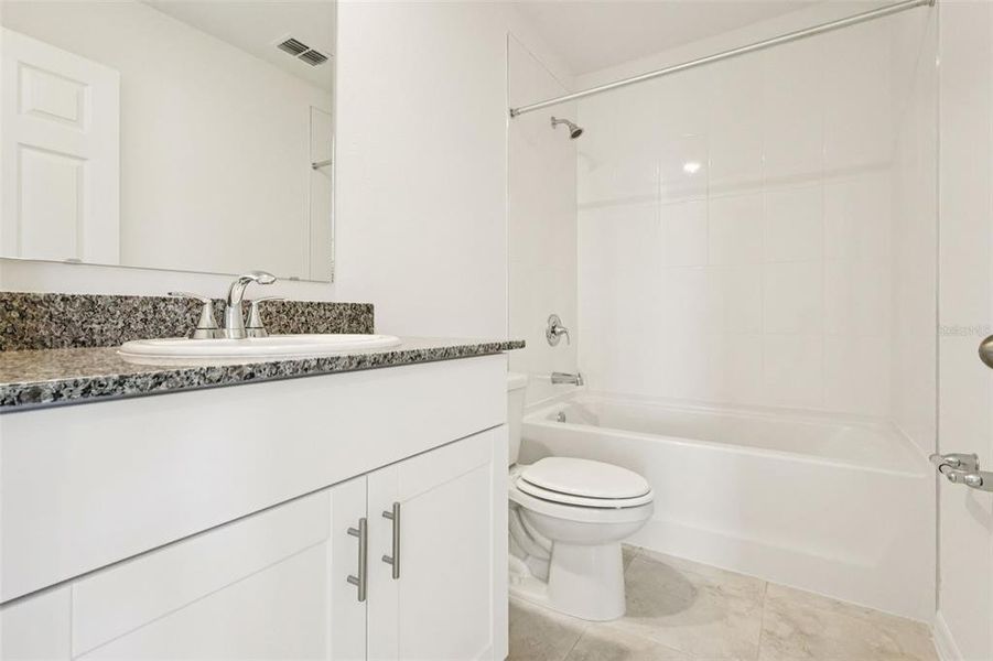 Furnished interior view inside a new home in , Poinciana (Image 12).