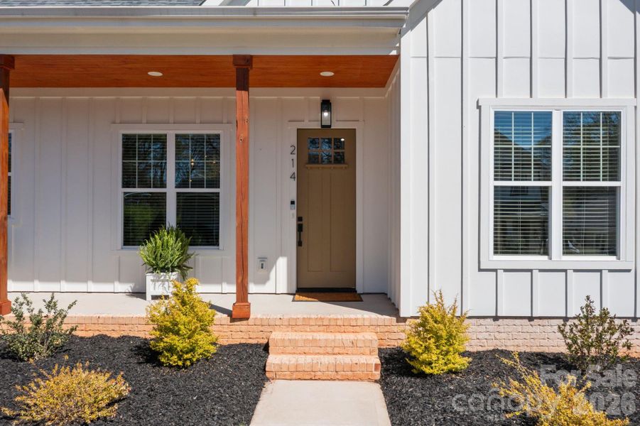 Exterior details and patio area of a home in , Belmont (Image 26).