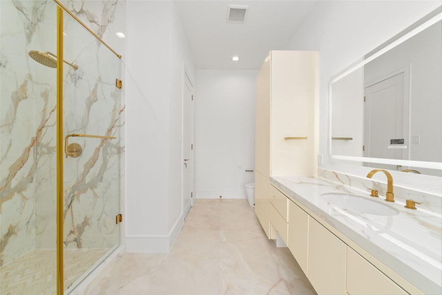 Luxury and functionality remain consistent throughout the home.