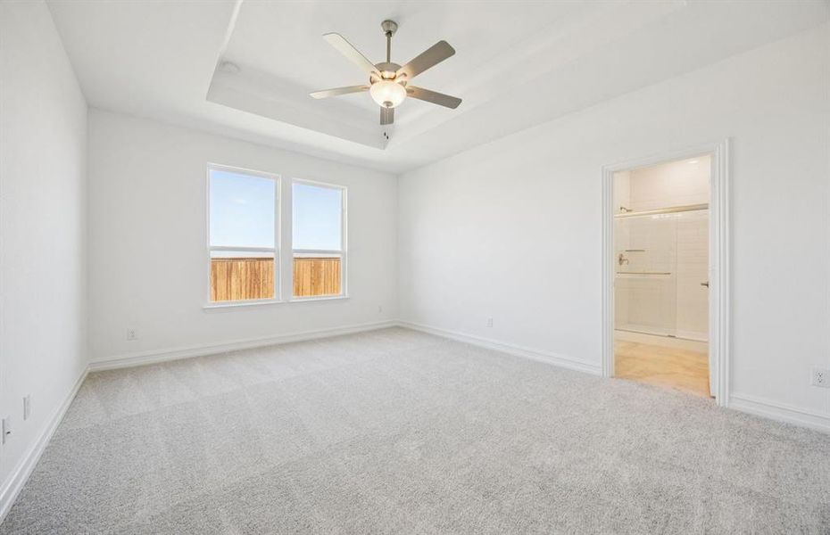 Spacious owner's suite with private bath