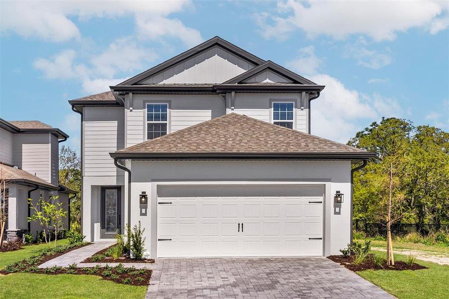 Front exterior of a new home in , Kissimmee, FL, highlighting curb appeal (Image 1). Front exterior of a new home in , Kissimmee, FL, highlighting curb appeal (Image 1).