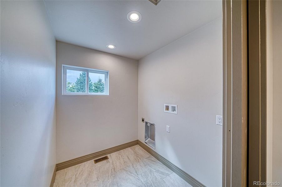 Laundry room conveniently located upstairs where all the bedrooms are.