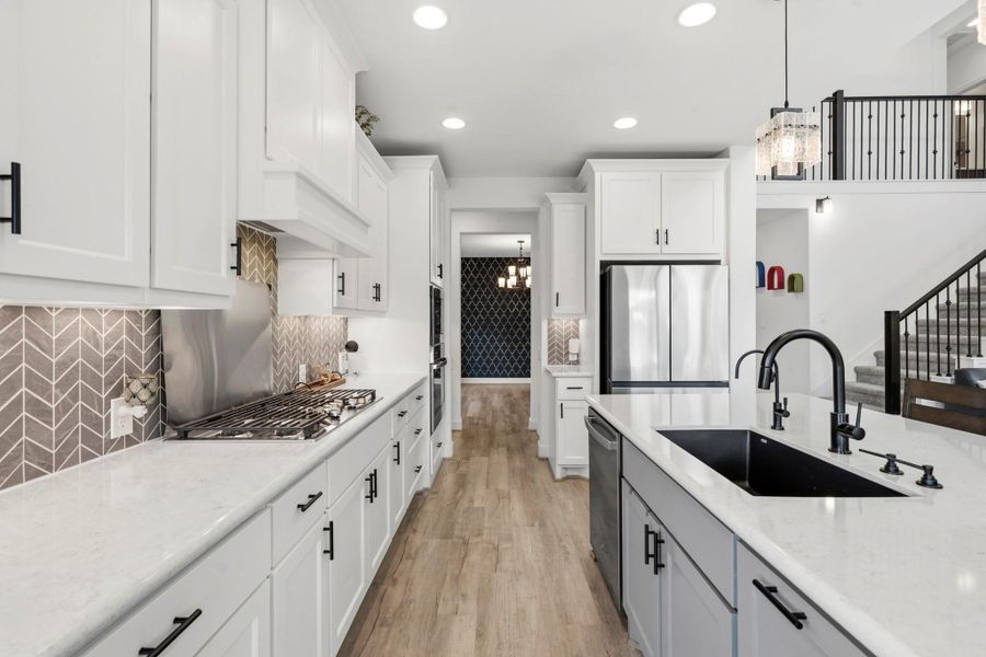 Your family and guests will enjoy many nights of fun, food and entertainment with ample counter space and kitchen island for setting up a wonderful array of provisions!