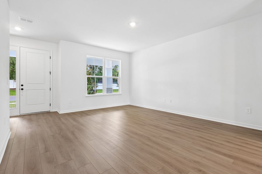 Representative unfurnished interior of a home built from the Florence by Hartizen Homes in Estes Reserve, Eustis (Image 87). Representative unfurnished interior of a home built from the Florence by Hartizen Homes in Estes Reserve, Eustis (Image 87).