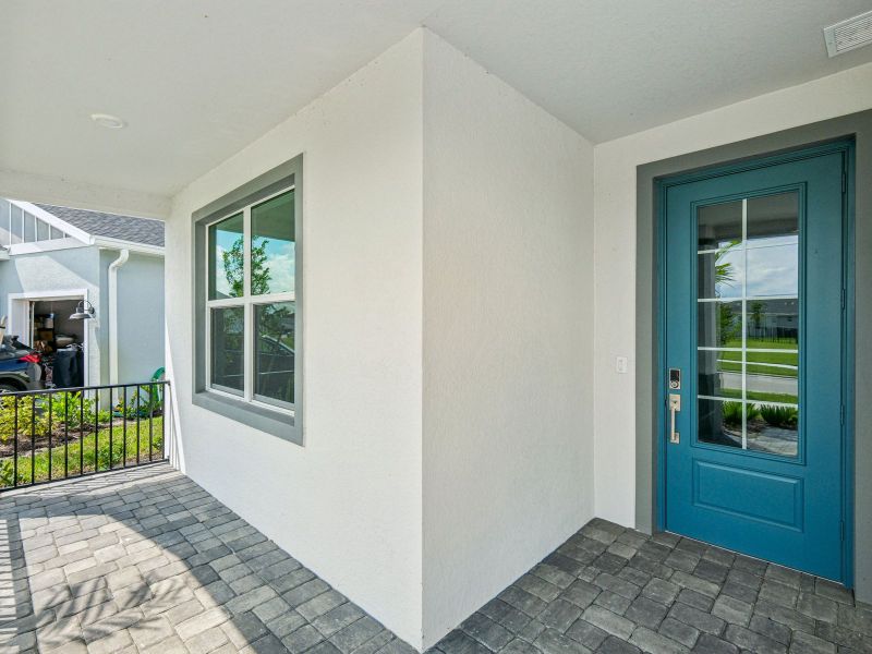 Exterior of the Onyx floorplan at 6406 NW Sweetwood Drive