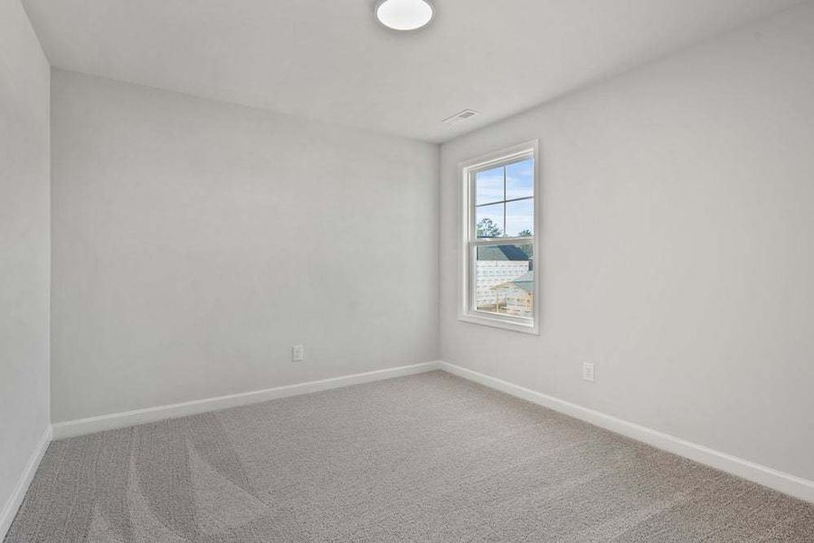 Representative unfurnished interior of a home built from the Camellia by Caviness & Cates Communities in Bartlett Manor, Youngsville (Image 54).