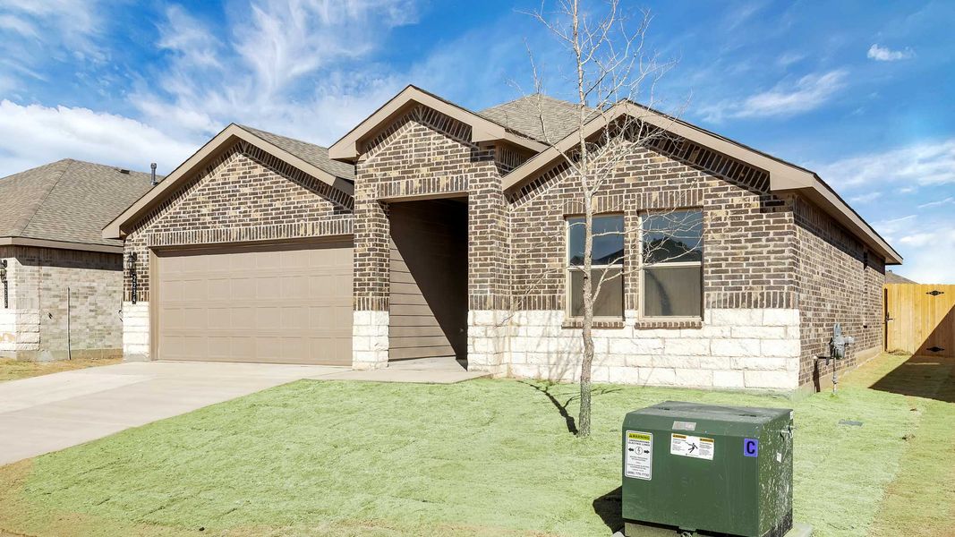 Front exterior of a new home in Allen Farms, Lubbock, TX, highlighting curb appeal (Image 15).