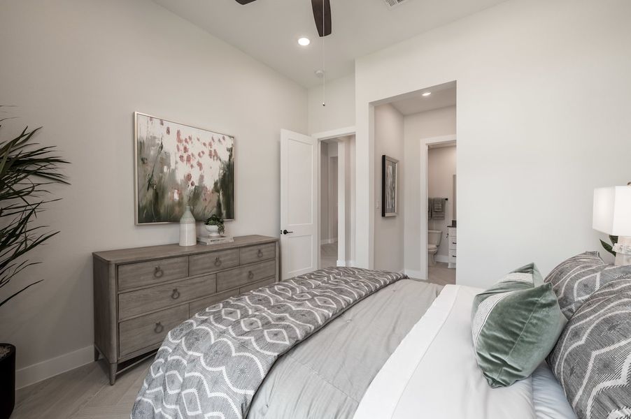 Representative furnished interior of a home built from the Carignan by Tri Pointe Homes in Woodson’s Reserve, Spring (Image 14).