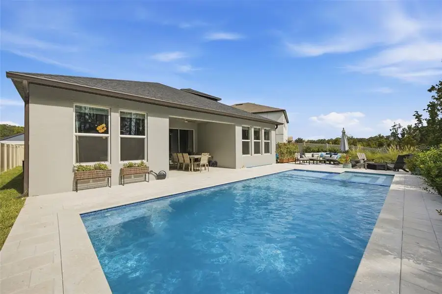 Exterior details and patio area of a home in Pearl Estates, Lutz (Image 26).