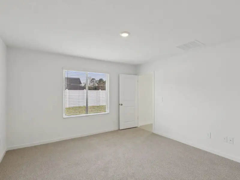 Spacious, unfurnished interior of a new home in Flagler Village - Signature Series, Palm Coast (Image 11).