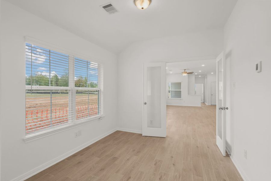 Representative unfurnished interior of a home built from the Chalet by Chesmar Homes in Woodforest, Montgomery (Image 7).